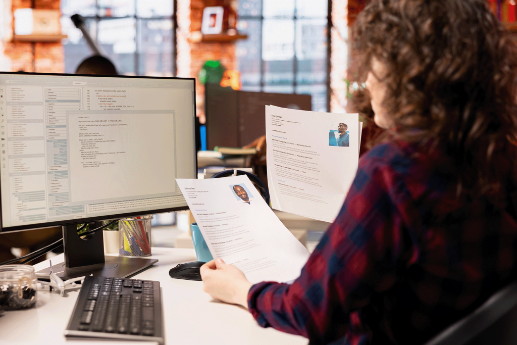 startup-hr-worker-identifying-right-candidates-job-opening-reviewing-resume